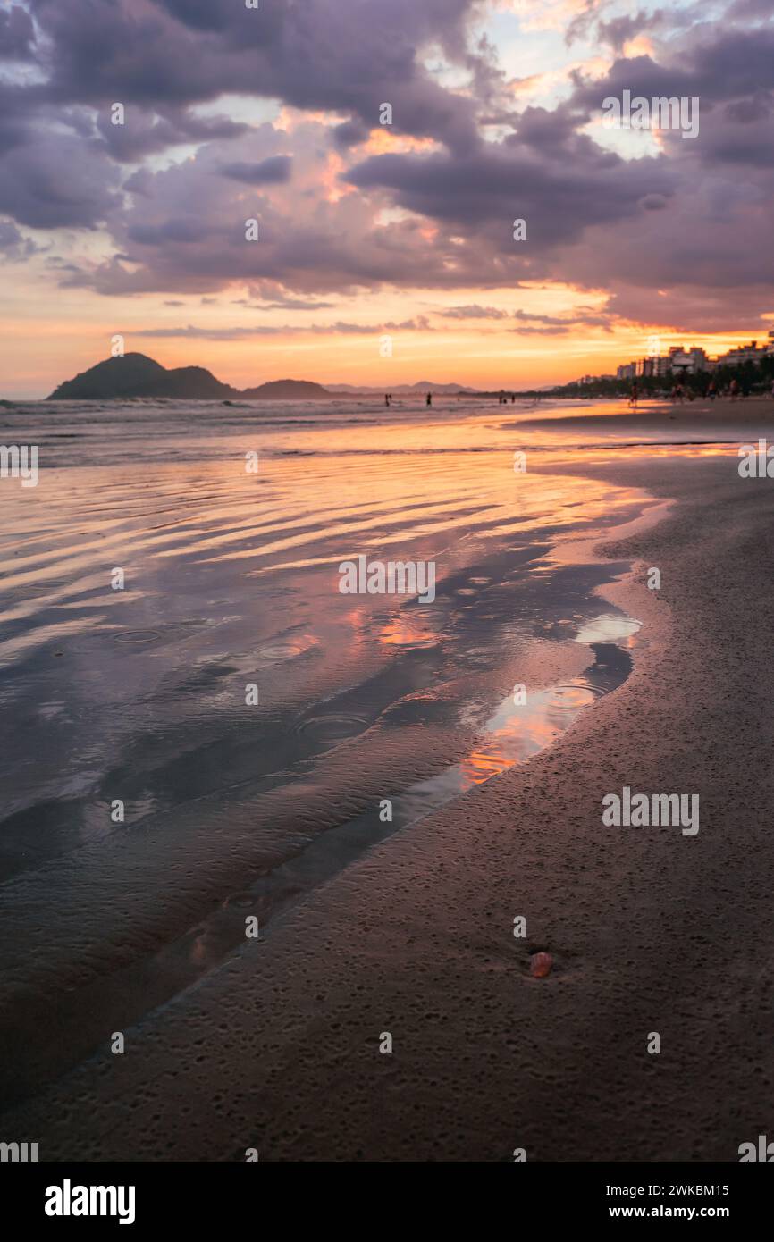 Beautiful sunset at the beach of Bertioga, São Paulo, Brazil. Stock Photo