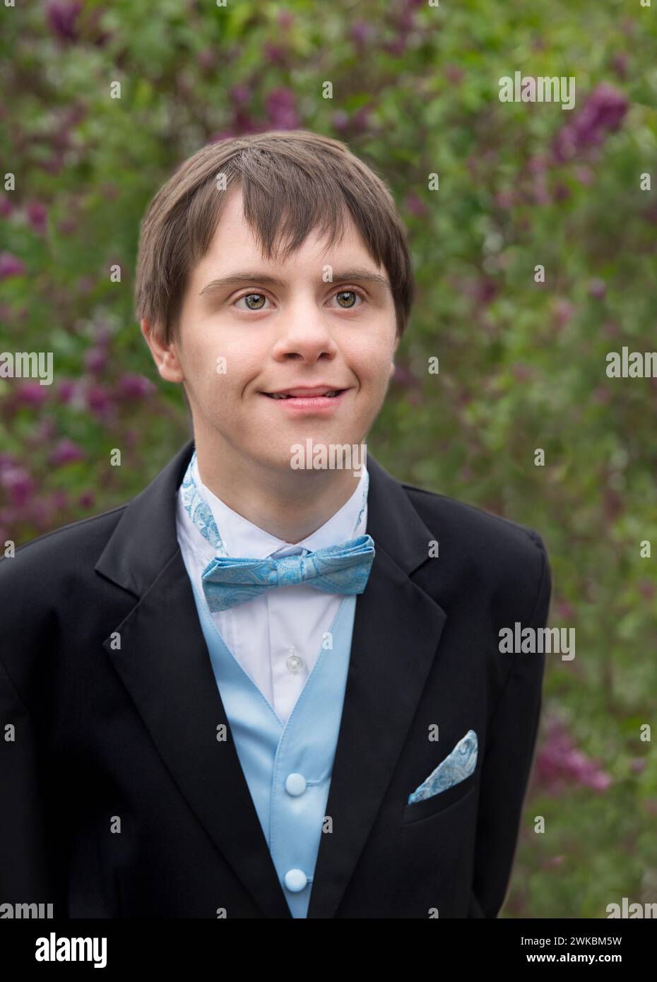 Teenage Boy with Special Needs in a Tuxedo Stock Photo