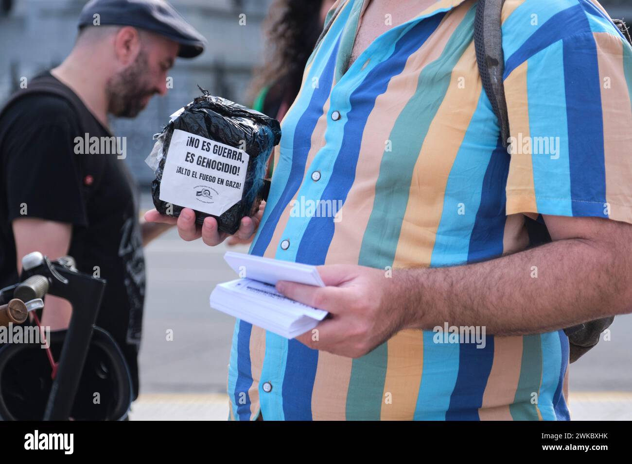 Buenos Aires, Argentina, Feb 16, 2024: People protesting downtown in solidarity with Palestine against Israel attack. Text: It is not war, it is genoc Stock Photo