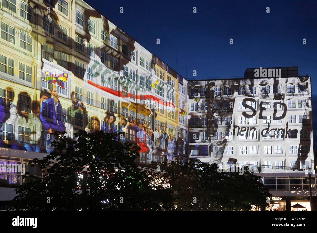 To mark the 30th anniversary of the fall of the Wall, 3D video projections of historical images and videos commemorate the events of the Peaceful Stock Photo