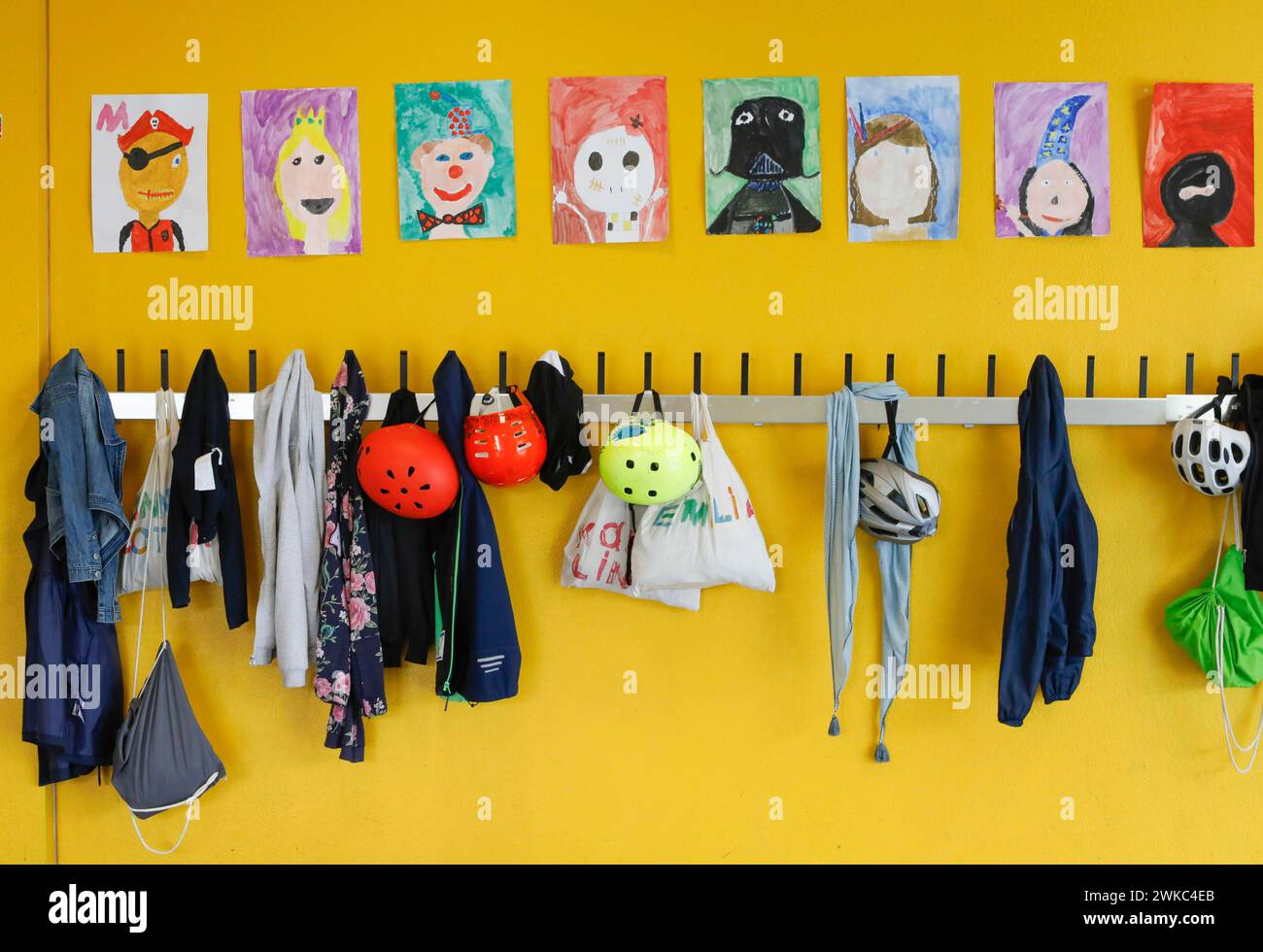 Jackets and bags hanging at a cloakroom in a Berlin primary school, 14/08/2019 Stock Photo