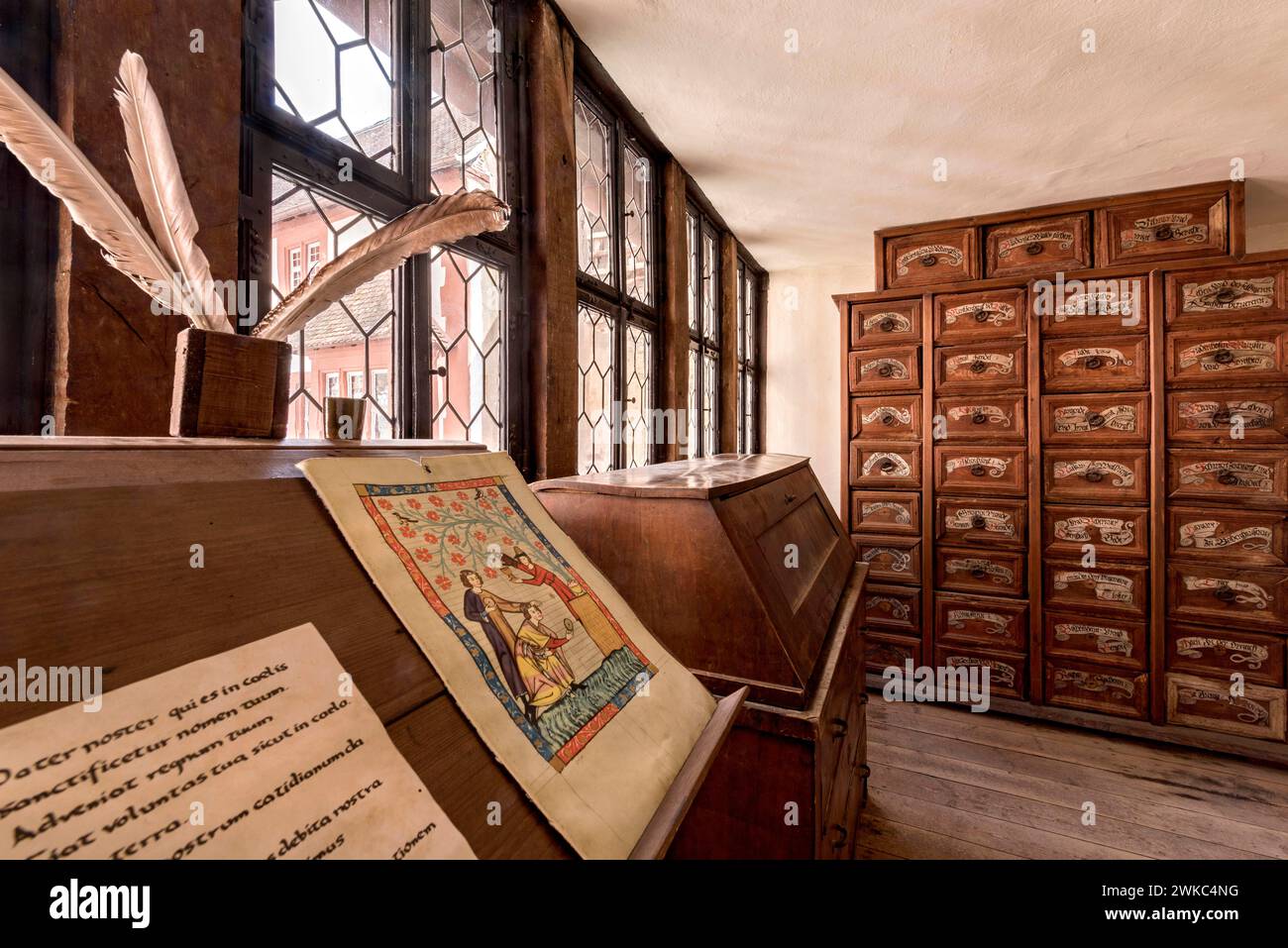 Secretary with quill and document, writing room, reading room, archive cabinet, medieval knight's castle, Ronneburg Castle, Ronneburger Huegelland Stock Photo