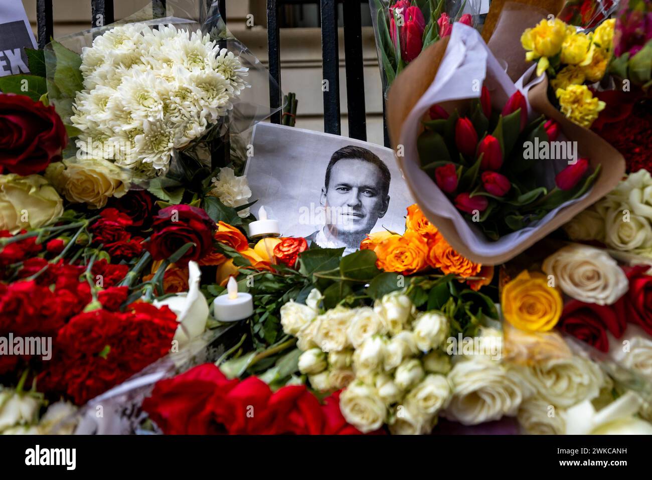Flowers and signs are placed outside the Russian Consulate for opposition leader and Putin critic Alexei Navalny on February 16, 2024 in New York City. According to Russian state media, Navalny, the Russian politician and anti-corruption activist who became the most potent voice in opposition to President Vladimir Putin, died during a walk at the IK-3 'Arctic Wolf' penal colony where he was serving a 30 year sentence. (Photo by Michael Nigro/Pacific Press) Credit: Pacific Press Media Production Corp./Alamy Live News Stock Photo