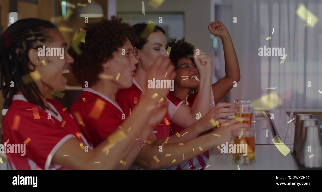 Image of confetti over happy diverse friends raising hands and drinking beer Stock Photo