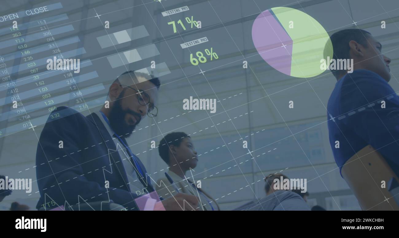 Image of statistic processing over business people at conference Stock Photo