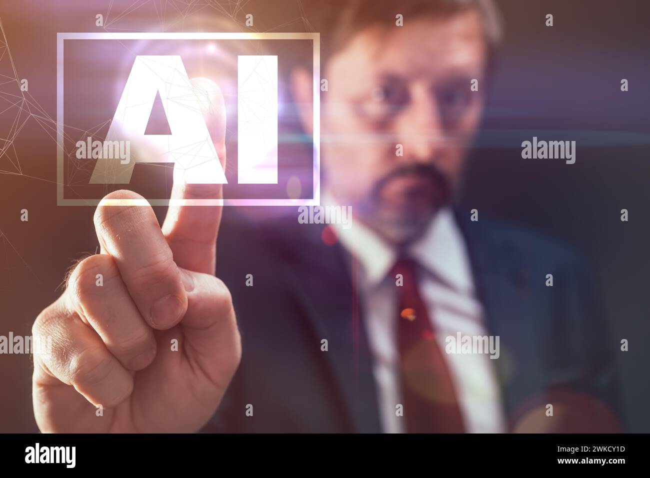 Businessman touching futuristic virtual screen of Artificial Intelligence software interface, selective focus Stock Photo