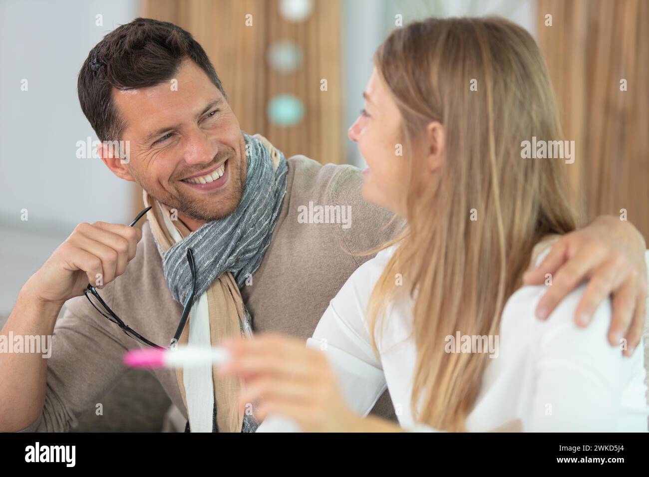 happy couple checking pregnancy test at home Stock Photo - Alamy