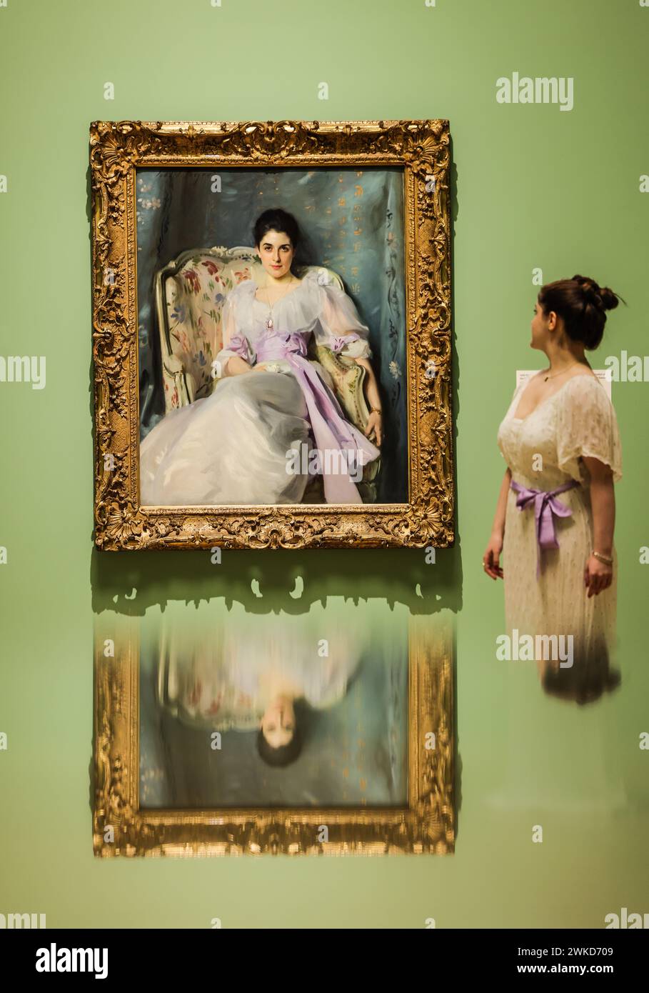 Tate Britain, London, UK. 20th Feb, 2024. Molly Agnew Right, descendant of the sitter in the painting, Lady Agnew of Lochnaw(Gertrude Vernon) 1892 oil on canvas, 22 Feb - 7 July  24 Credit: Paul Quezada-Neiman/Alamy Live News Stock Photo