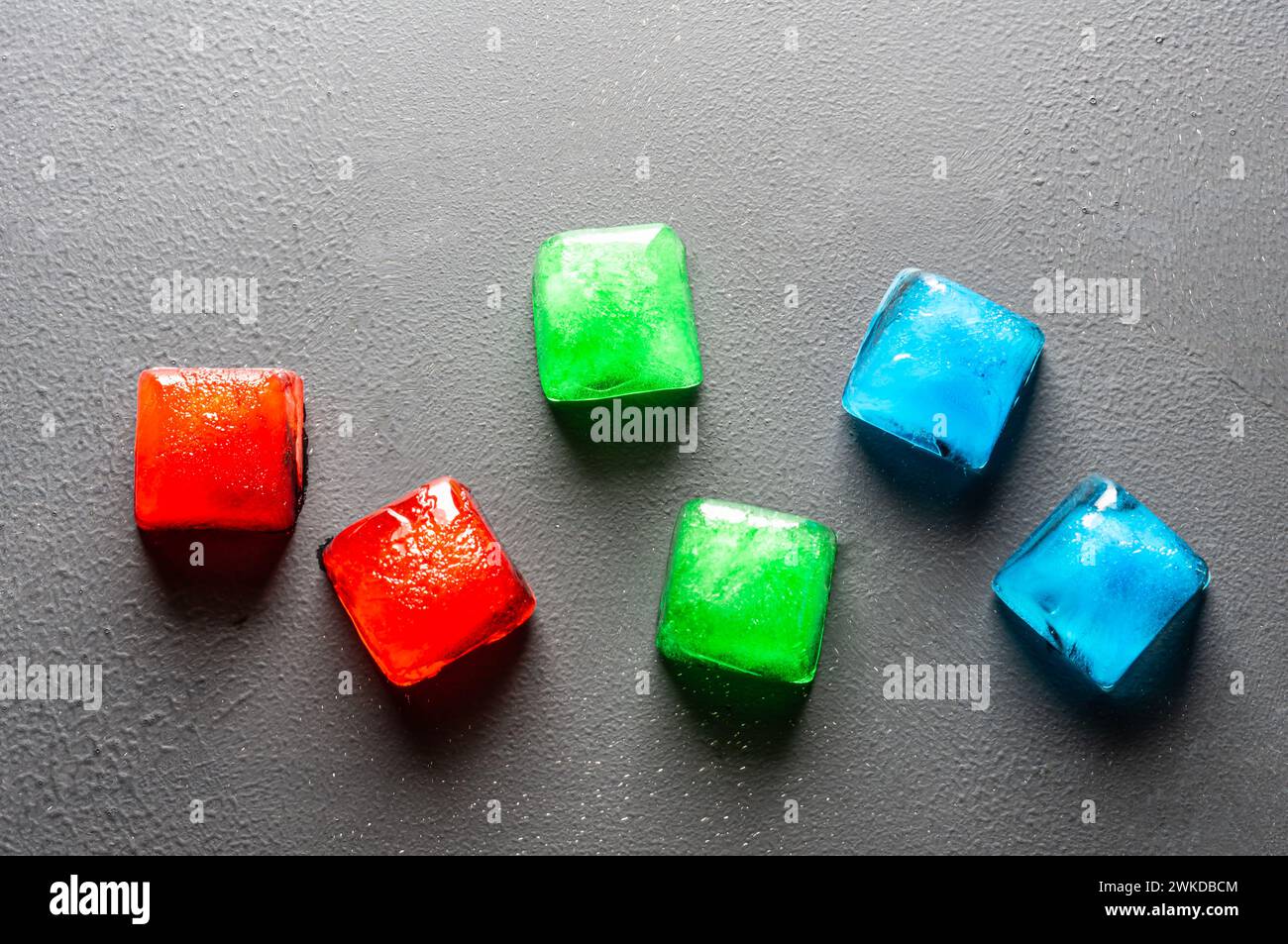 Rgb color ices in on dark table, Rgb color model concept Stock Photo