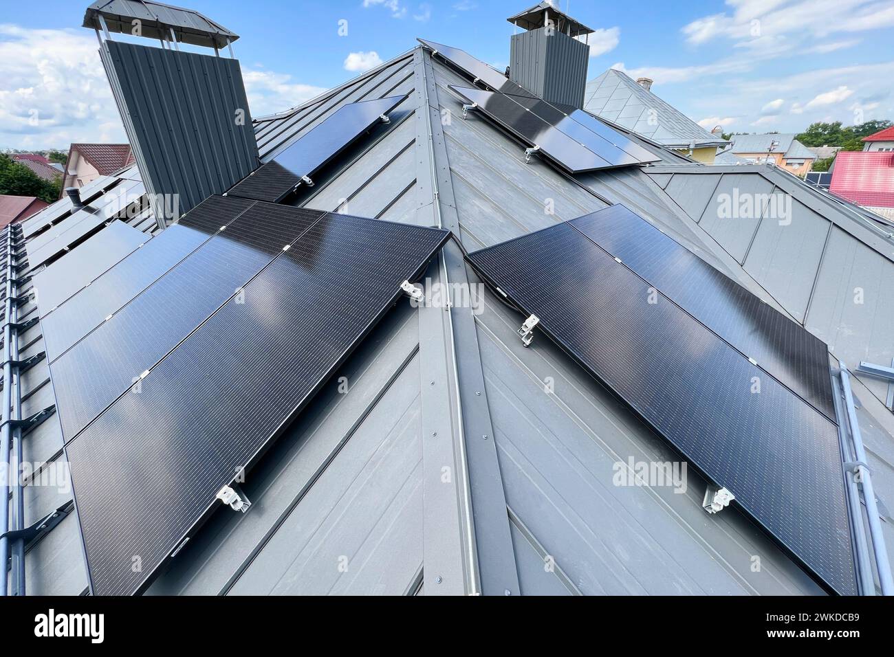 House with solar panels on rooftop for generating electricity through ...