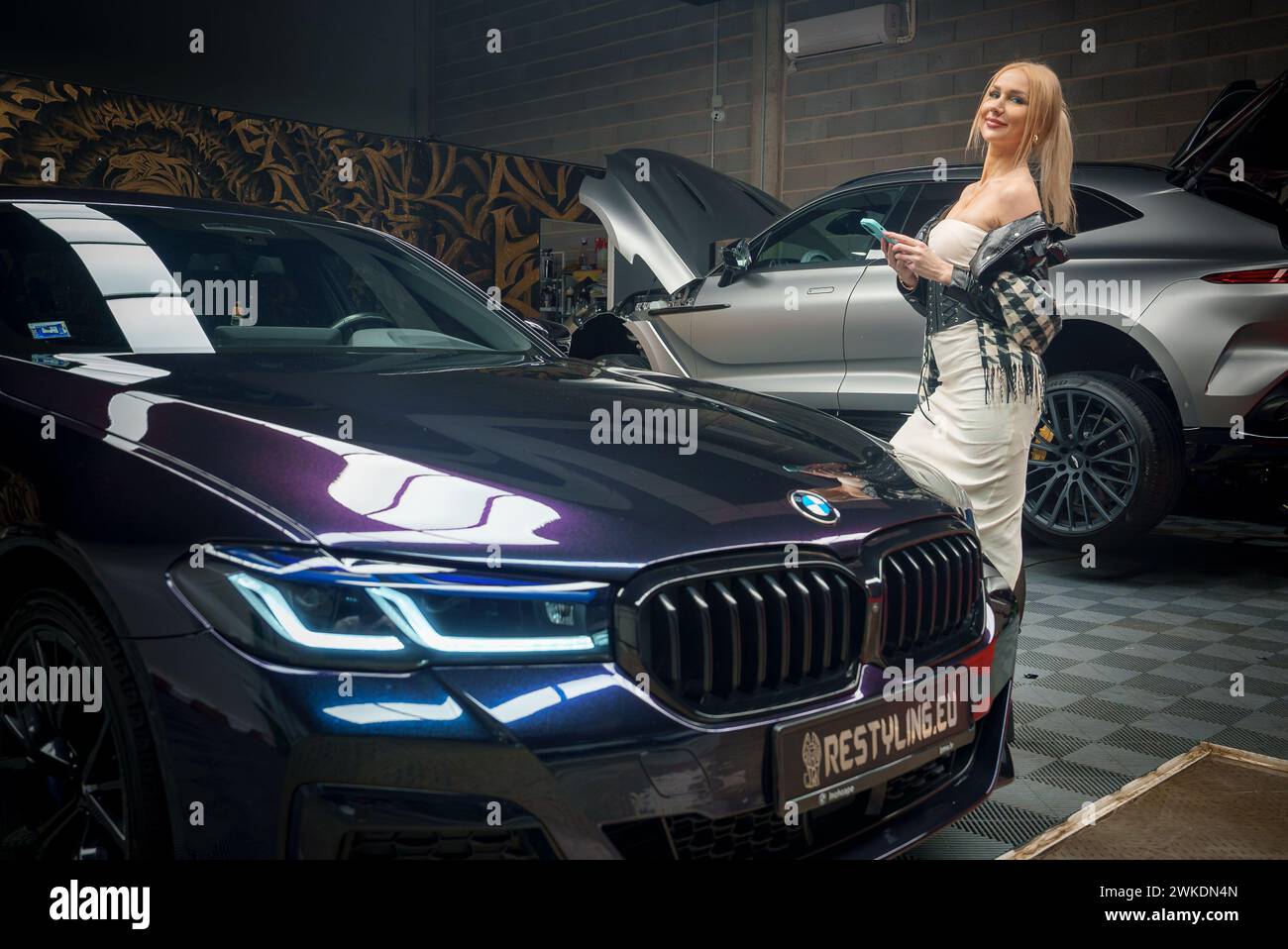 BMW Tuning, Detailing with a Model at the Luxury Auto Garage Service ...