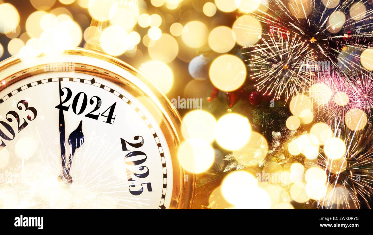 Gold retro clock shows New Year 2024 with golden lights, Christmas tree and vintage toys. Happy New Year and Christmas card Stock Photo