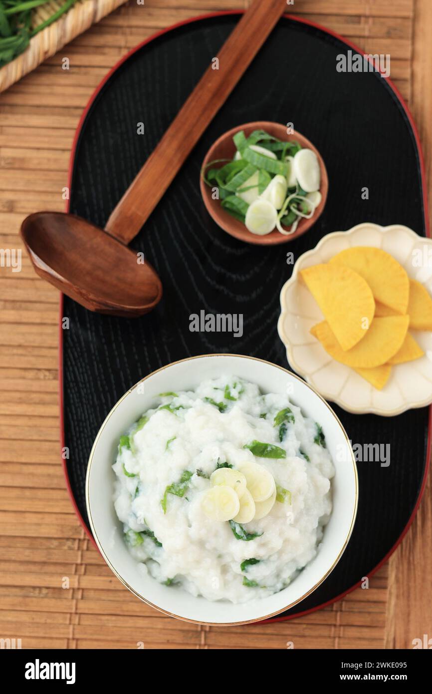 Rice Porridge with Seven Herbs or Nanakusa Gayu Stock Photo