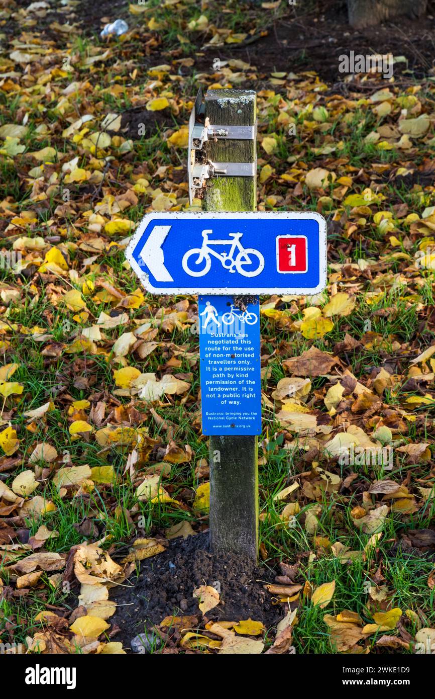 Sustrans sign on a permissive path followed by National Cycle Route 1 at Holkham, north Norfolk. Stock Photo