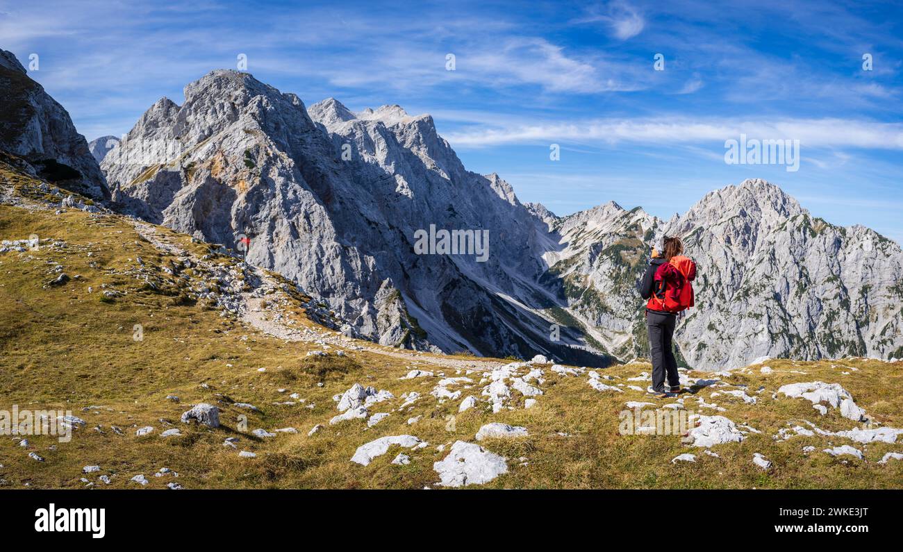mountaineer woman front Turska Gora mountain, 2251 meters, Jujian alps, Slovenia, Central Europe,. Stock Photo