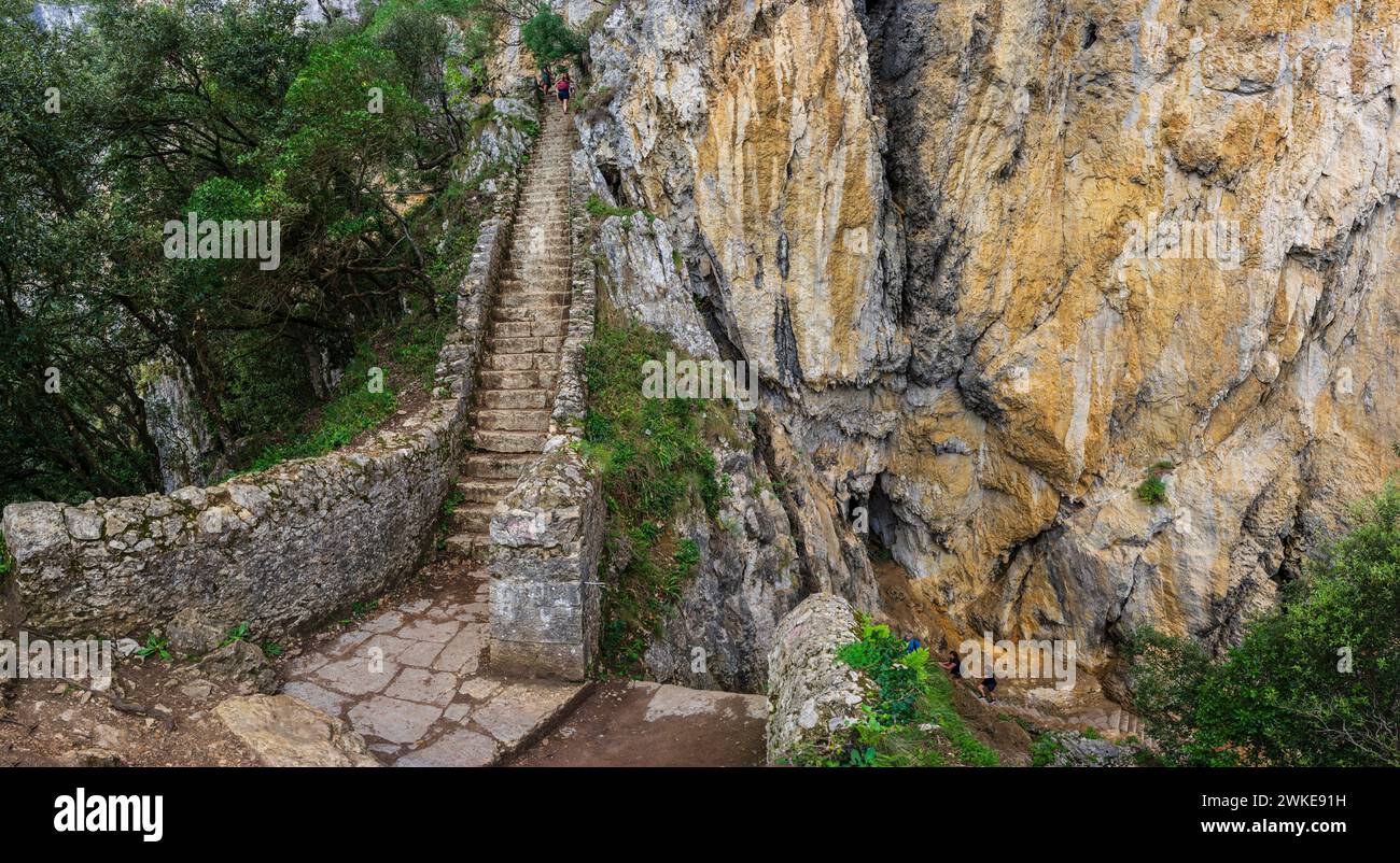 ascent of the stairs of Del Caballo lighthouse, Buciero mountain, Santoña, Cantabria, Spain. Stock Photo