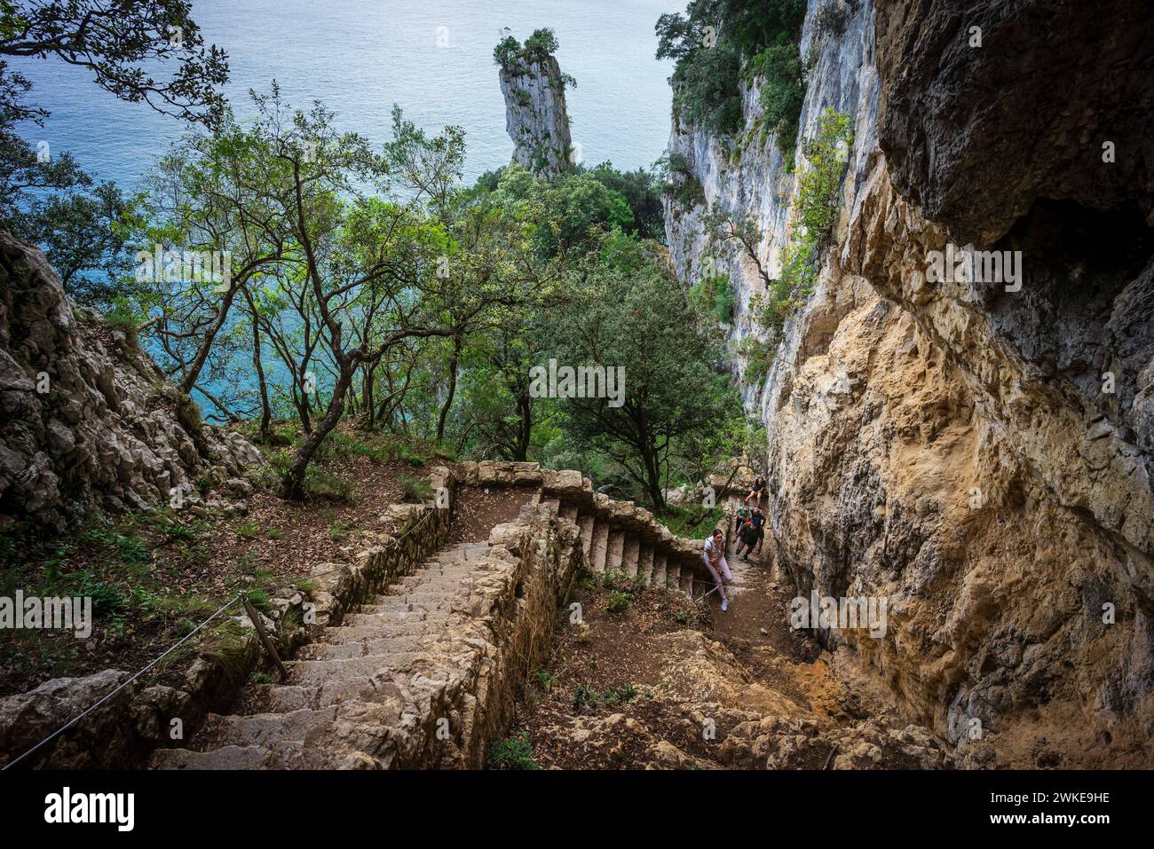ascent of the stairs of Del Caballo lighthouse, Buciero mountain, Santoña, Cantabria, Spain. Stock Photo