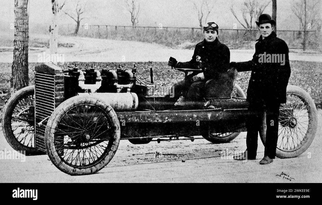 Henry Ford, standing, and Barney Oldfield in 1902, with the Ford 999 racing automobile Stock Photo