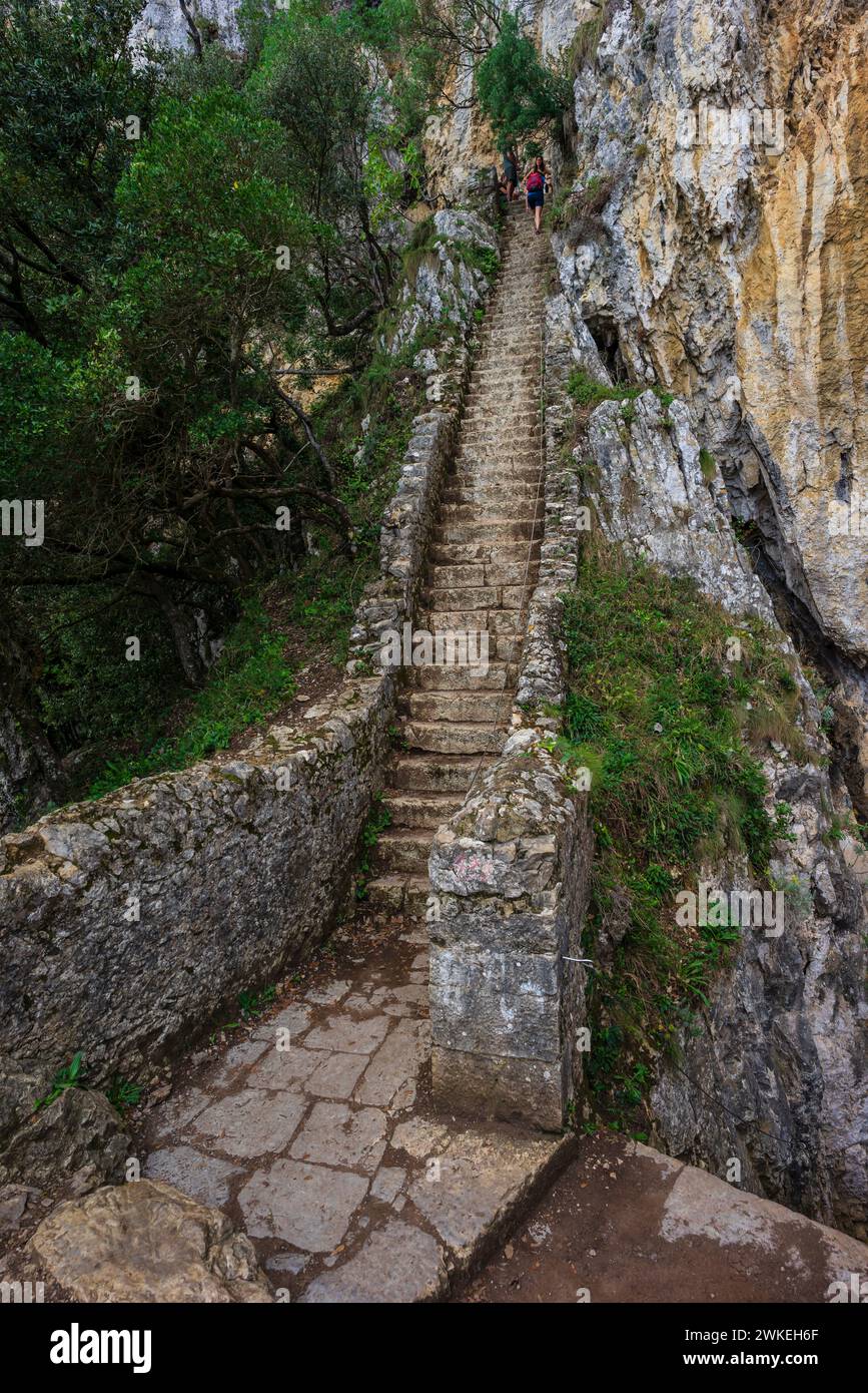 ascent of the stairs of Del Caballo lighthouse, Buciero mountain, Santoña, Cantabria, Spain. Stock Photo