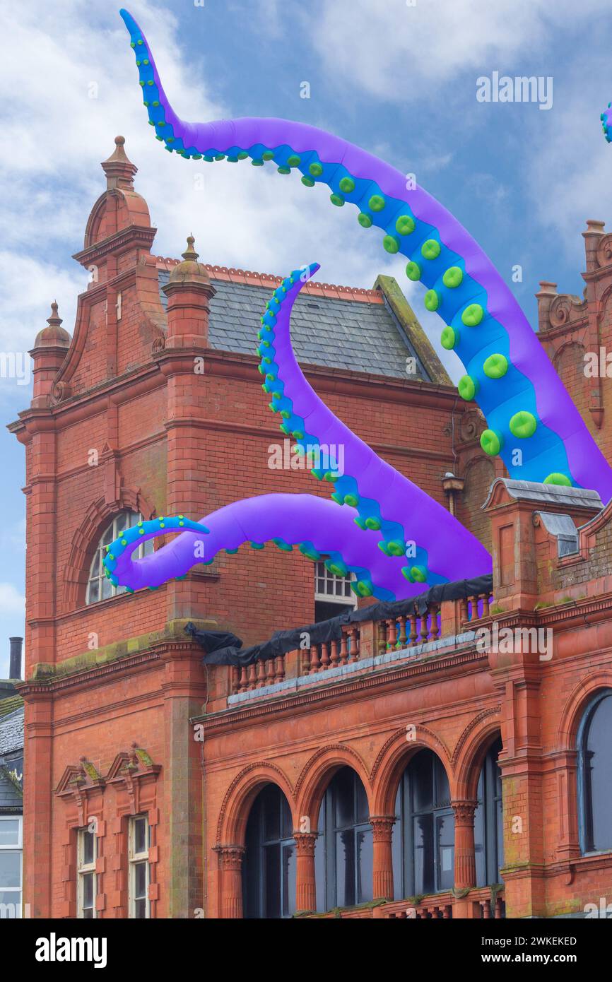 Giant octopus tentacles emerging from the Morecambe Winter Gardens for Morecambe Baylight 2024 festival, Lancashire, England Stock Photo