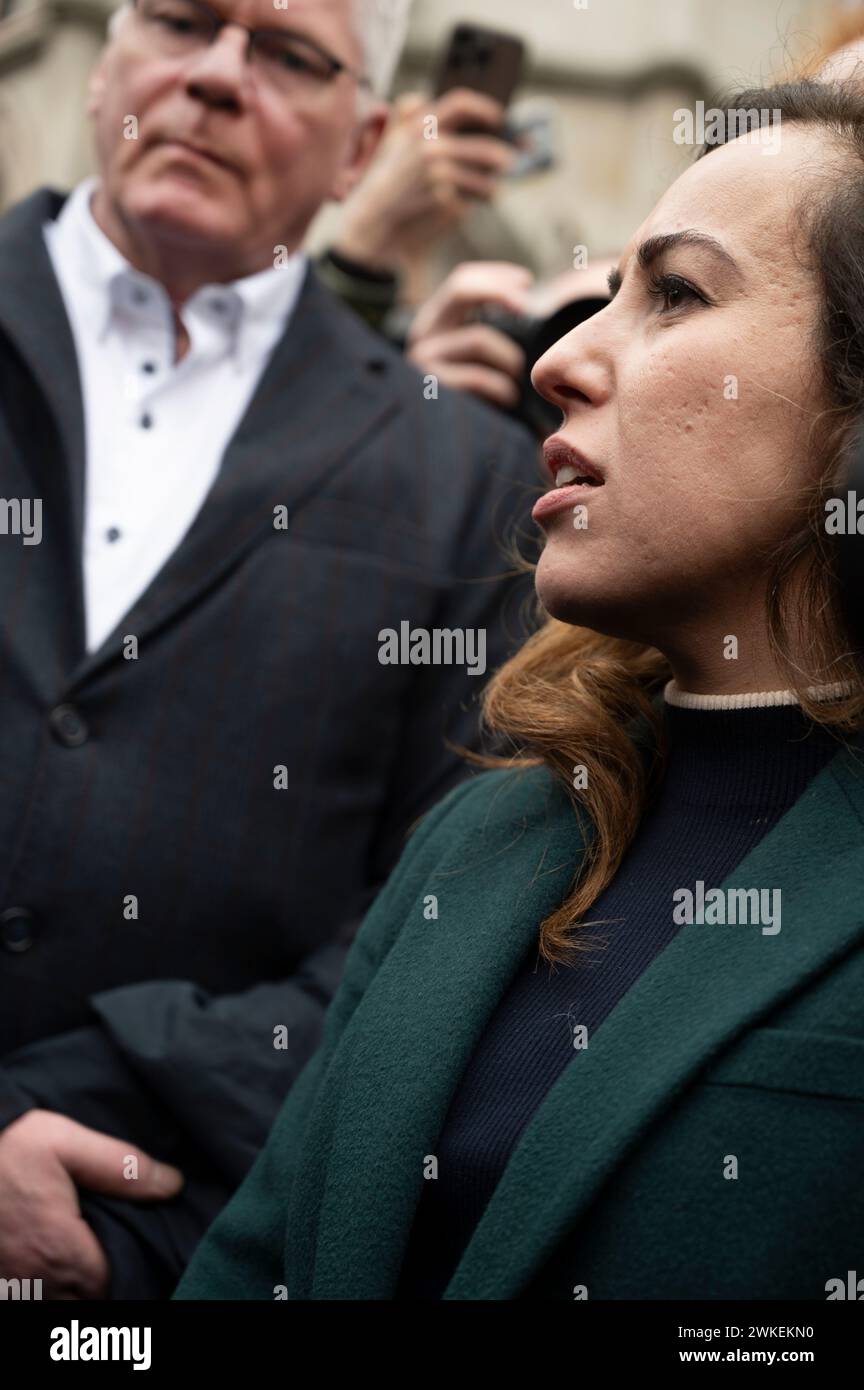 Supporters of Wikileaks founder Julian Assange demonstrate outside the Royal Courts of Justice demanding his freedom at the start of a 2 day hearing t Stock Photo