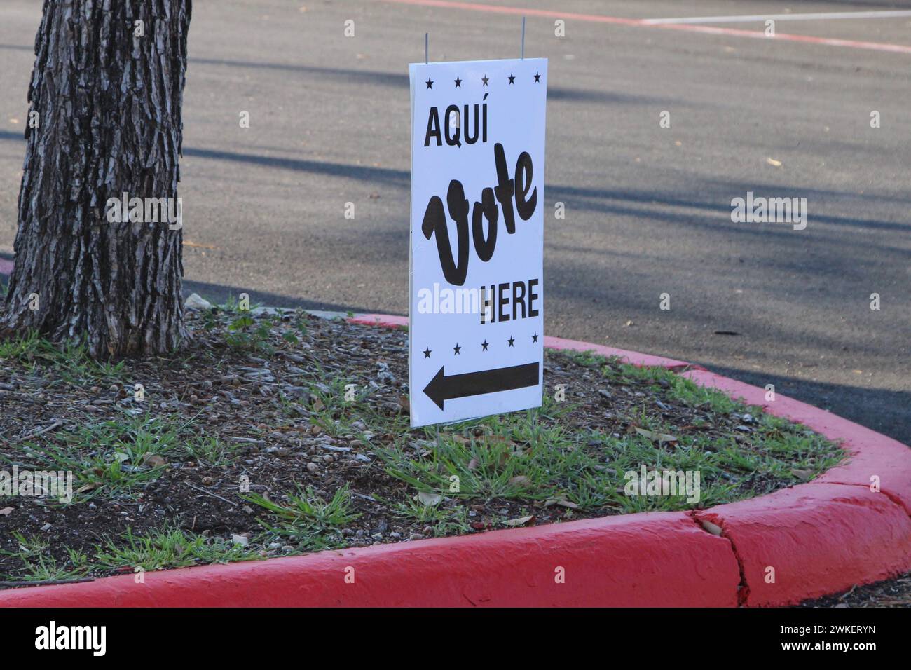 San Antonio, USA. 20th Feb, 2024. An Aqui Vote Here sign at the Guerra