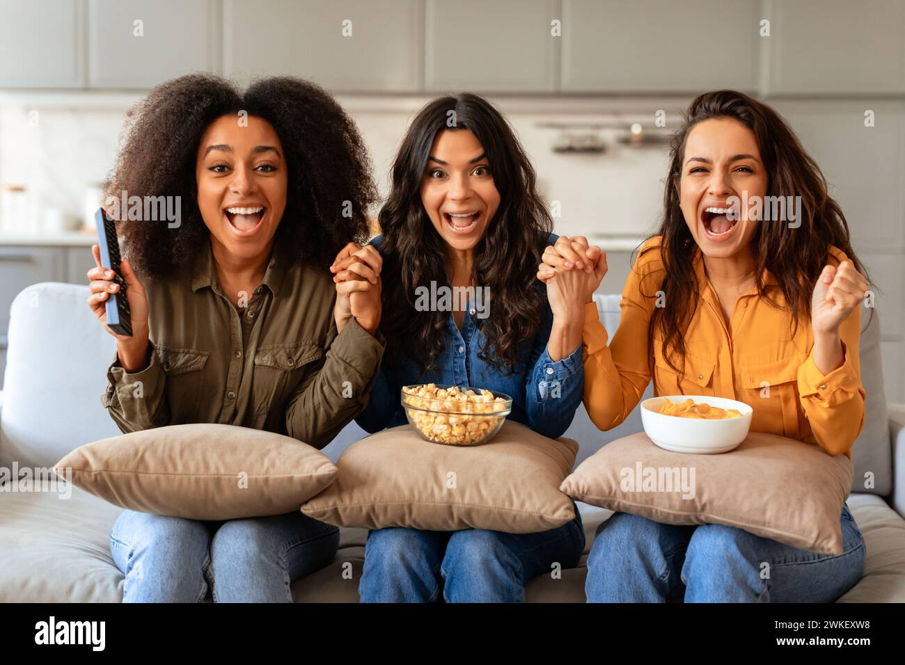 Shouting popcorn caucasian young hi-res stock photography and images ...
