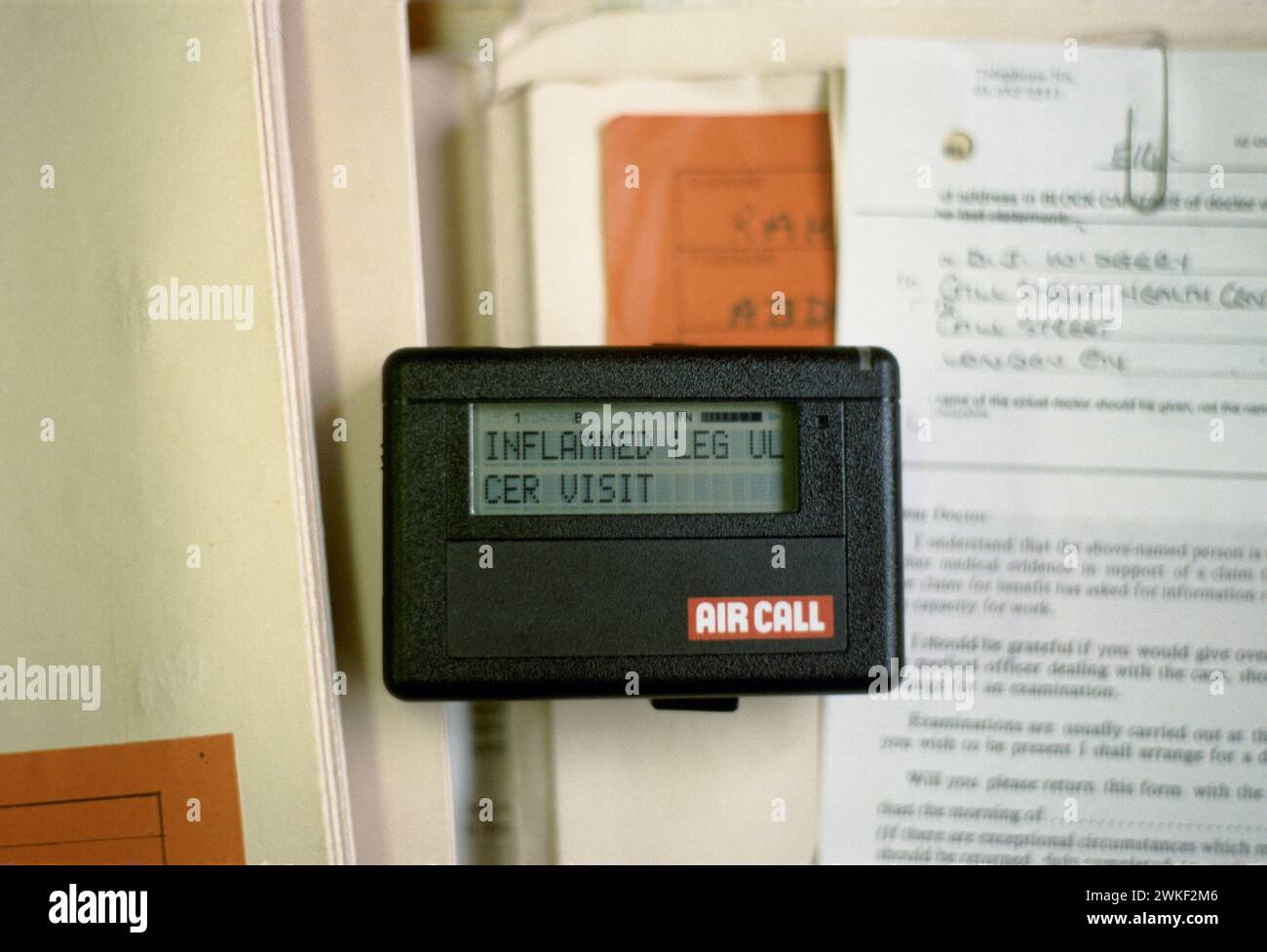 Pager on doctors desk 1980s. Dr David Widgery was a British was a