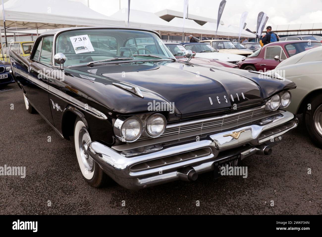 Three-Quarters Front View of a Black, 1959, Desoto Fireflite Sportsmans  Coupe, on sale in the Iconic Auction, at the 2023 Silverstone Festival Stock Photo