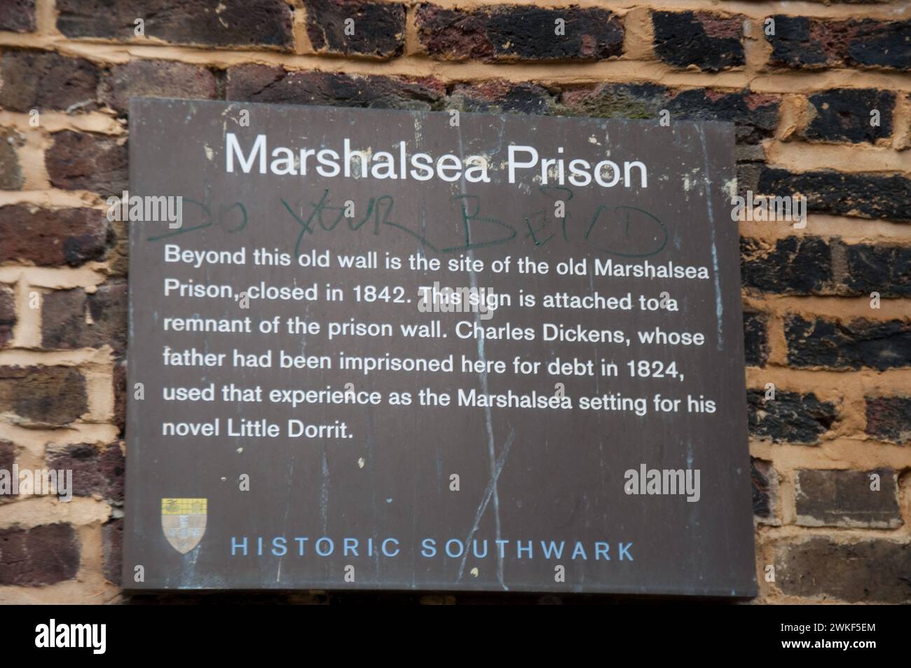 Sign indicating the position of Marshalsea Prison, Southwark, London, UK Stock Photo
