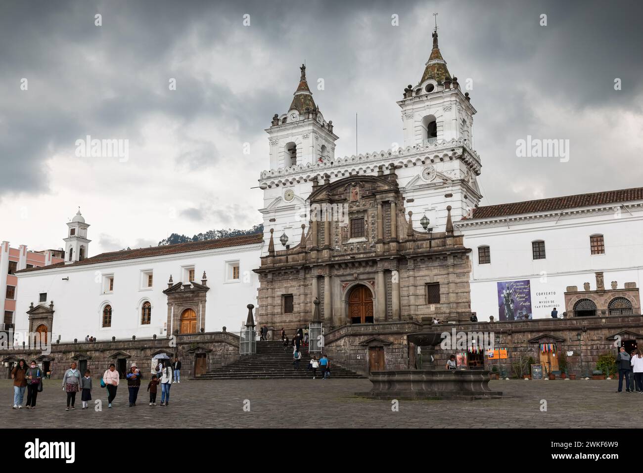 Quito, Ecuador - March 21, 2023: Plaza de San Francisco and St Francis Church with tourists in the capital of Ecuador. Stock Photo