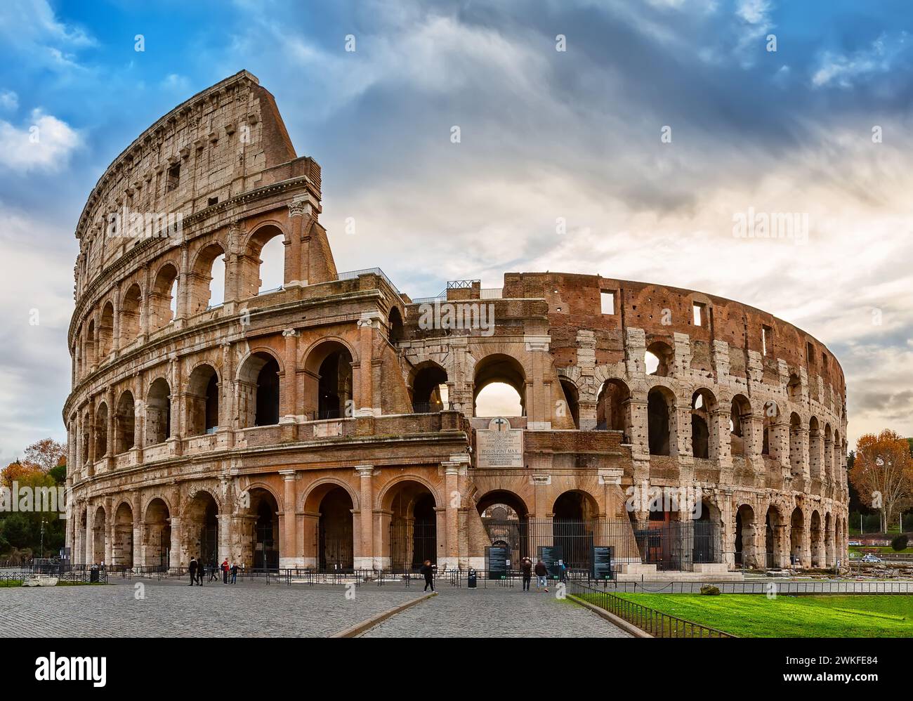 Colosseum (Coliseum) is one of main travel attraction of Rome in Italy. Ancient Roman ruins, landscape of old Rome city. Stock Photo