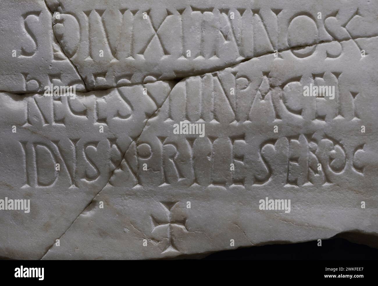 Tombstone of Sagenis. Inscription referring to Sagenis, who died at the age of 50. Text: 'SAGENIS FAMVLV/S DEI VIXIT ANNOS L / RECESSIT IN PACE II / IDVS APRILES ERA DC' (Sagenis, a servant of God, lived for 50 years. He died peacefully on 12th April 600 of the Spanish Era). Detail. Marble. 562 AD. Provenance unknown. Museum of Visigoth Councils and Culture. Toledo, Castile-La Mancha, Spain. Stock Photo
