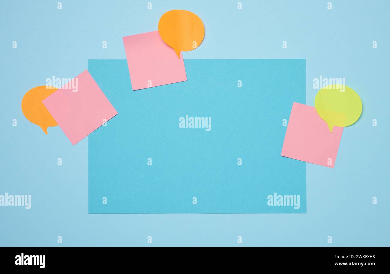 Blank rectangular sheet of paper on a blue background, coy space Stock Photo