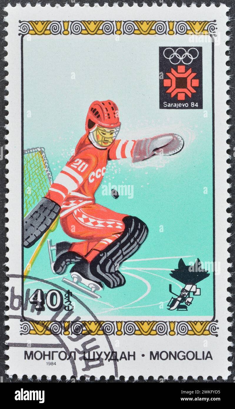Cancelled postage stamp printed by Mongolia, that shows Hockey, Winter Olympic Games 1984 - Sarajevo, circa 1984. Stock Photo