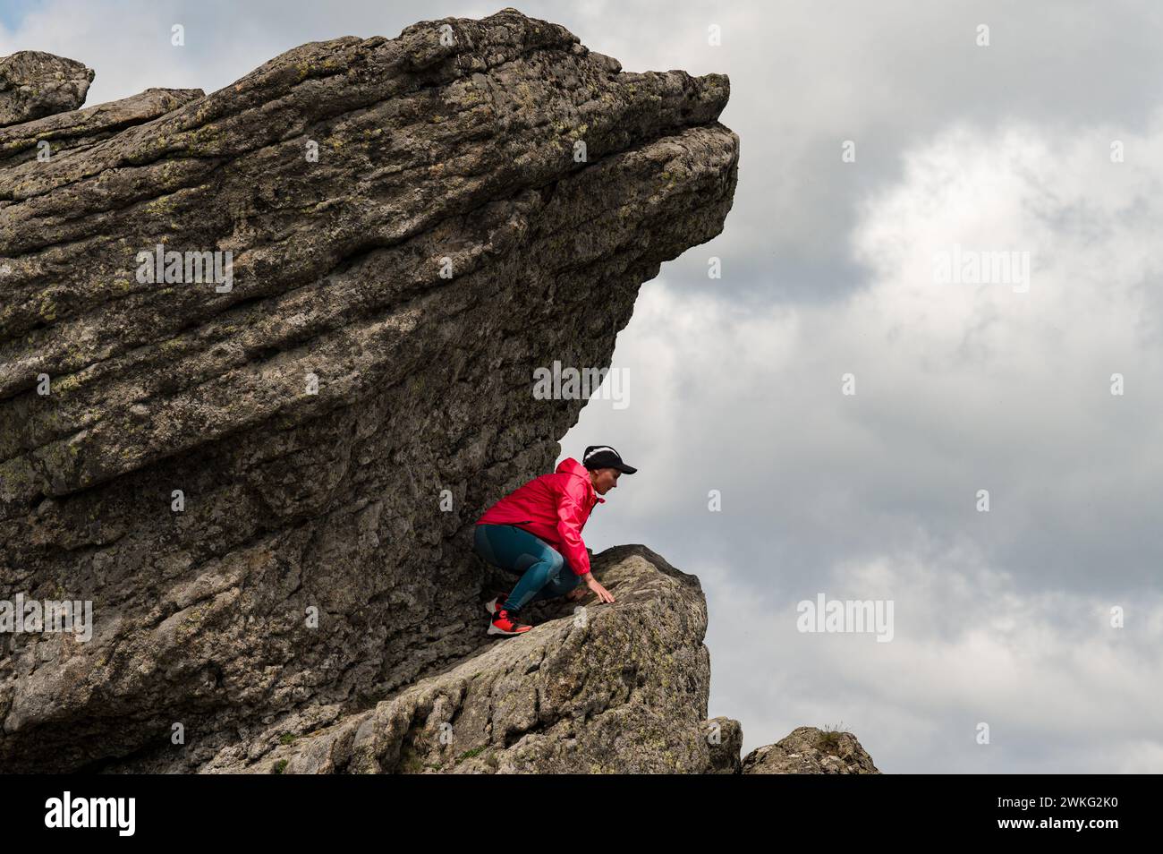 Woman climber climbed high hi-res stock photography and images - Alamy