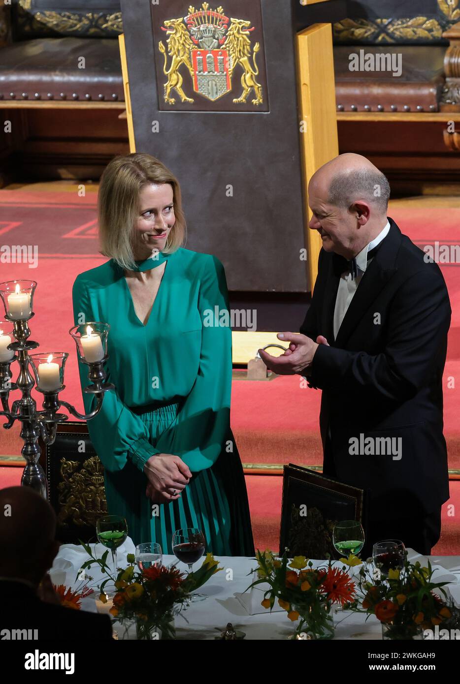 Hamburg, Germany. 20th Feb, 2024. Kaja Kallas (l), Prime Minister of the Republic of Estonia, stands next to Federal Chancellor Olaf Scholz (SPD) after her speech at the traditional Matthiae-Mahl of the Hamburg Senate in the Great Festival Hall of the City Hall. The Matthiae-Mahl is considered to be the oldest still celebrated banquet in the world. This year's guests of honor are Kallas and Federal Chancellor Olaf Scholz. Credit: Christian Charisius/dpa/Alamy Live News Stock Photo