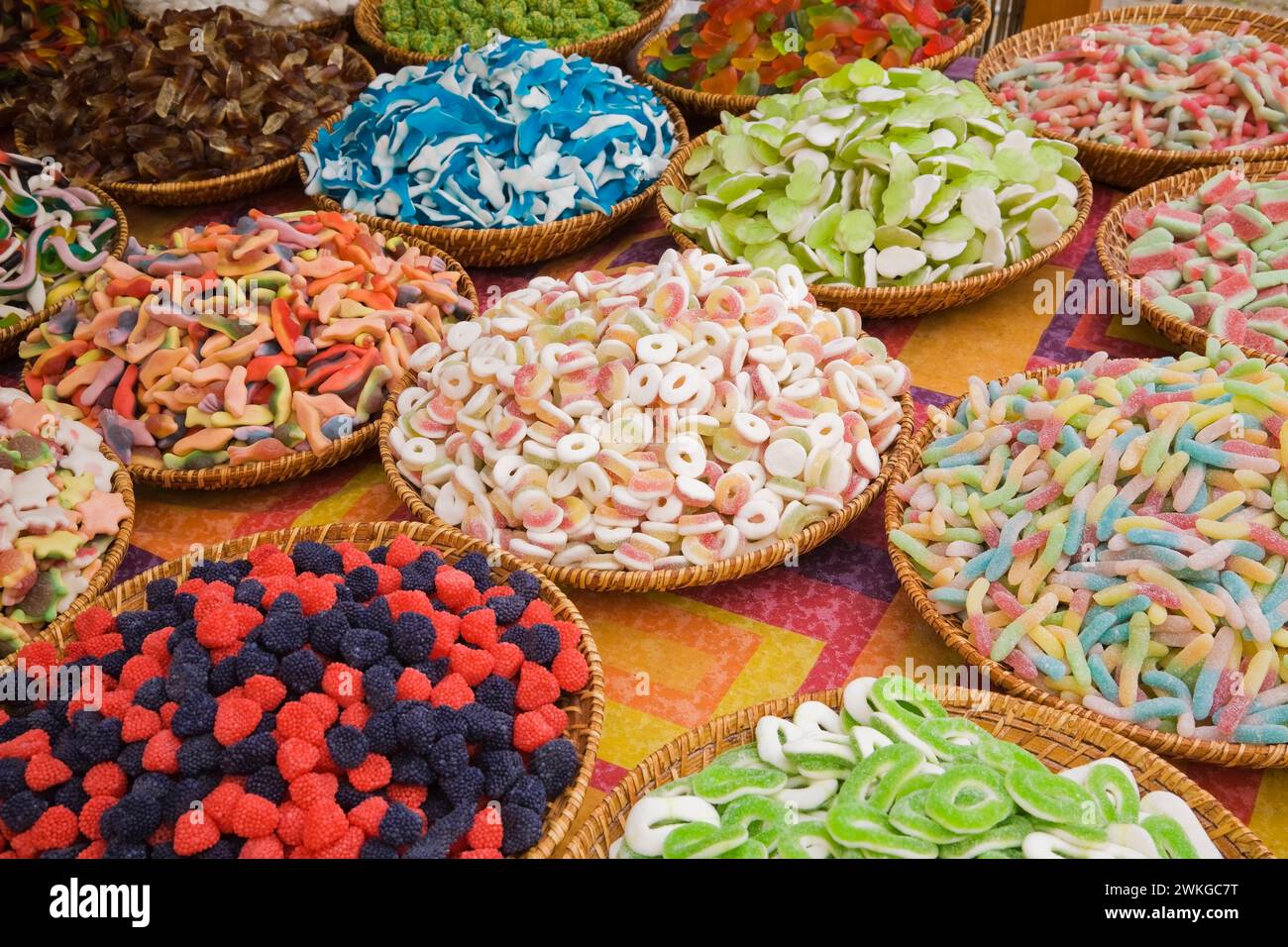 Baskets of assorted candies on display at outdoor market, Budapest, Hungary. Stock Photo