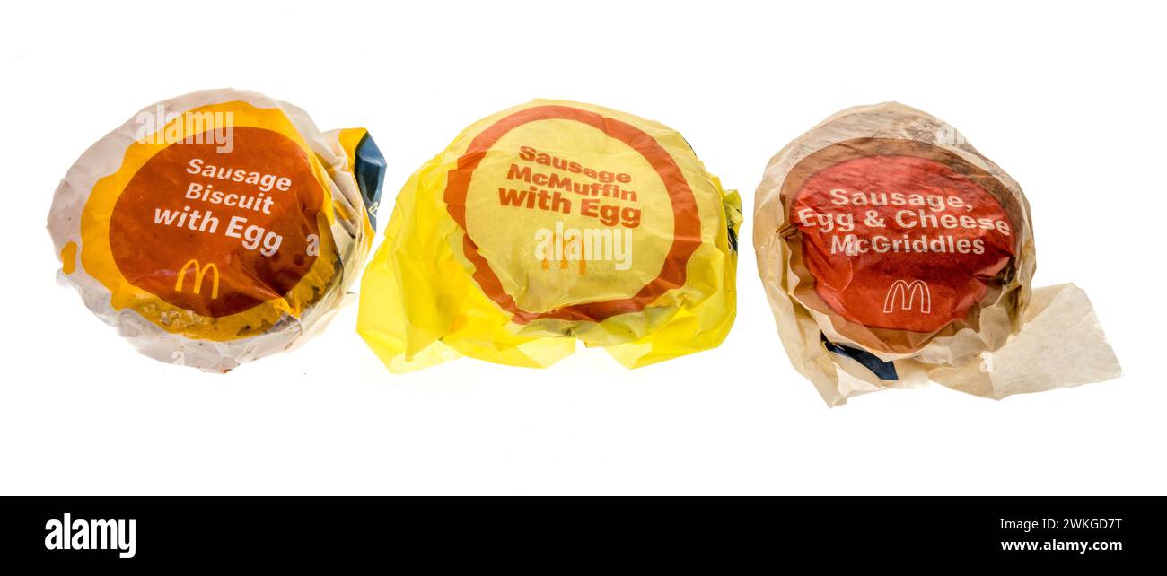 Winneconne, WI - 20 February 2024: A package of McDonalds sausage, egg, and cheese Mcgriddles, McMuffin and biscuit breakfast sandwiches on an isolate Stock Photo