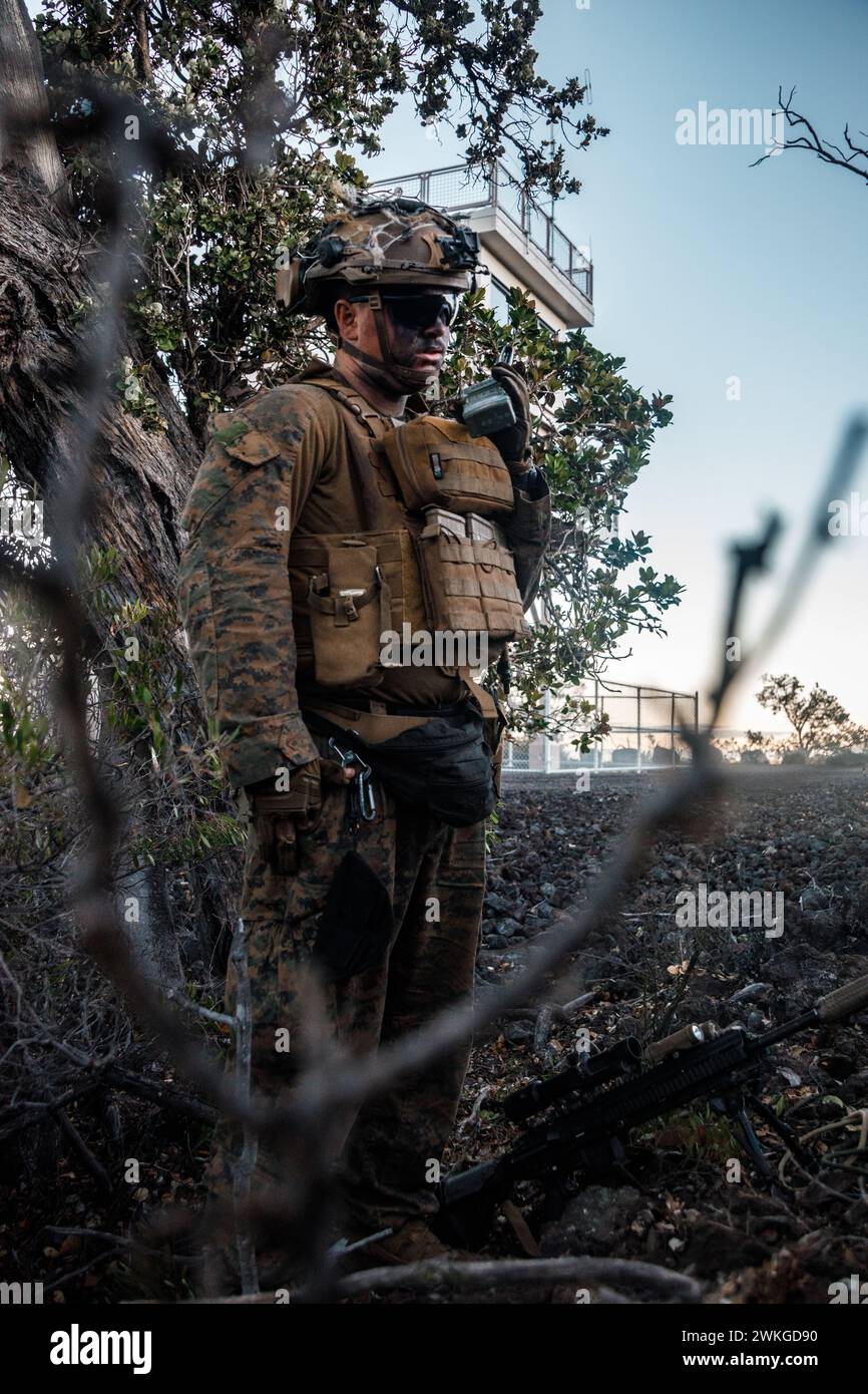 U.S. Marine Corps Cpl. Zachary Miller speaks on an AN/PRC-152 radio for ...