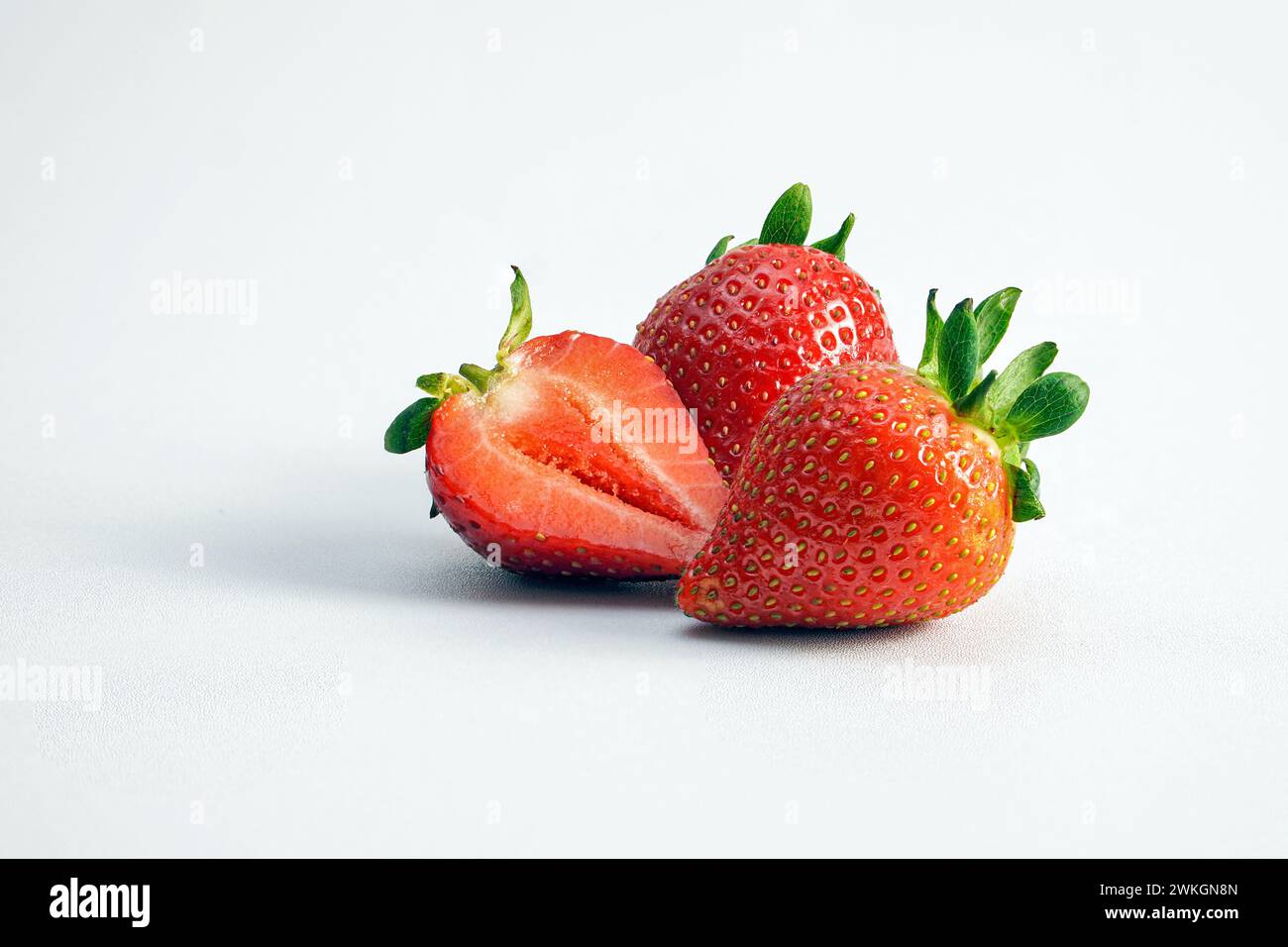 Fresh strawberries on white background Stock Photo - Alamy