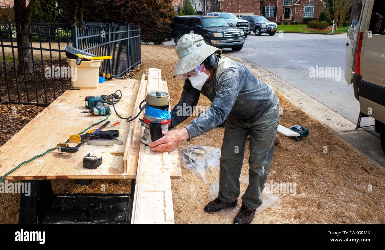 Preparing tongue and grove 1x6 before insatlling into Mercedes Benze sprinter van. Cary, NorthCarolina Stock Photo