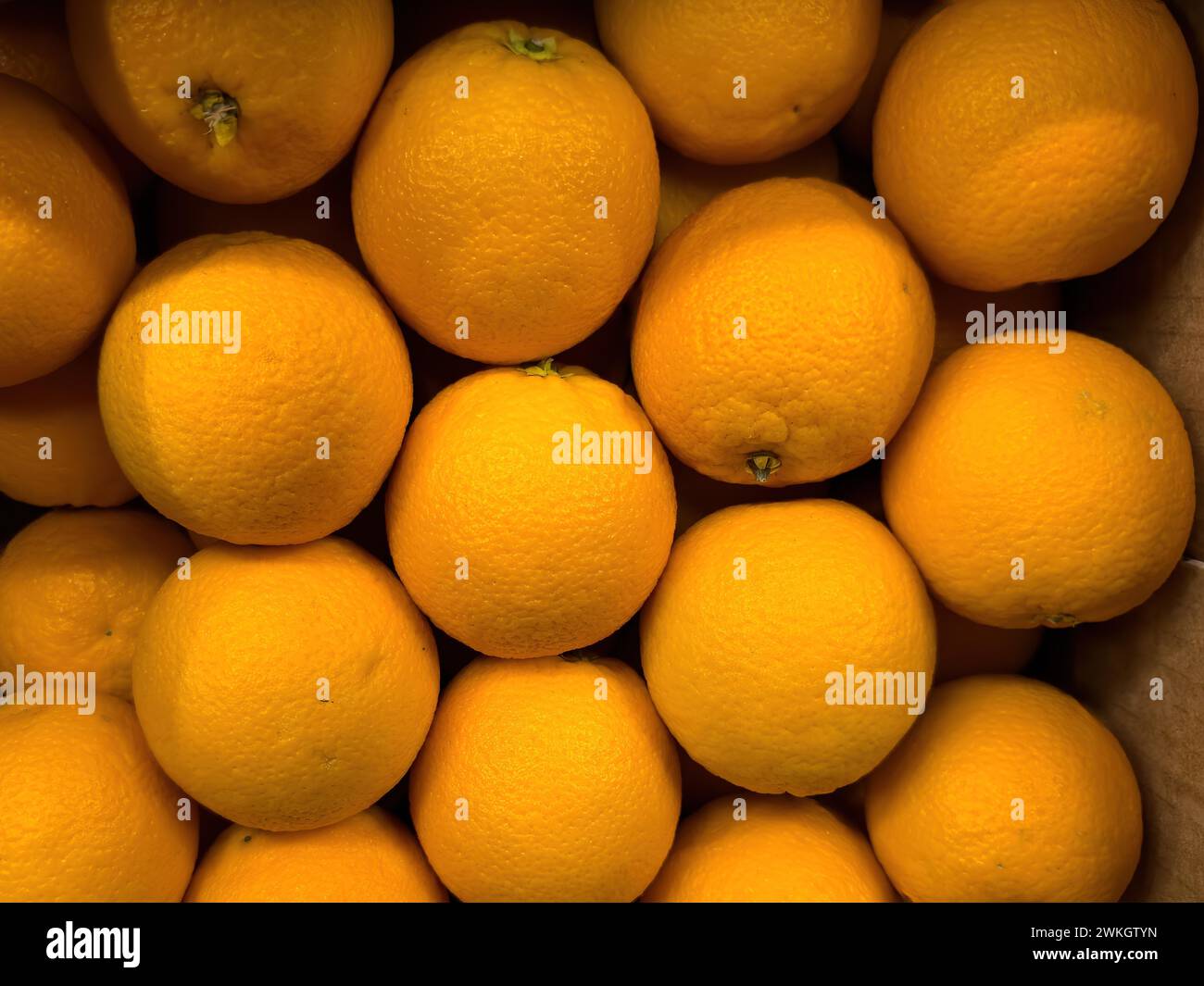 Oranges with high vitamin C content in display of grocery shop food retailer supermarket, Germany Stock Photo