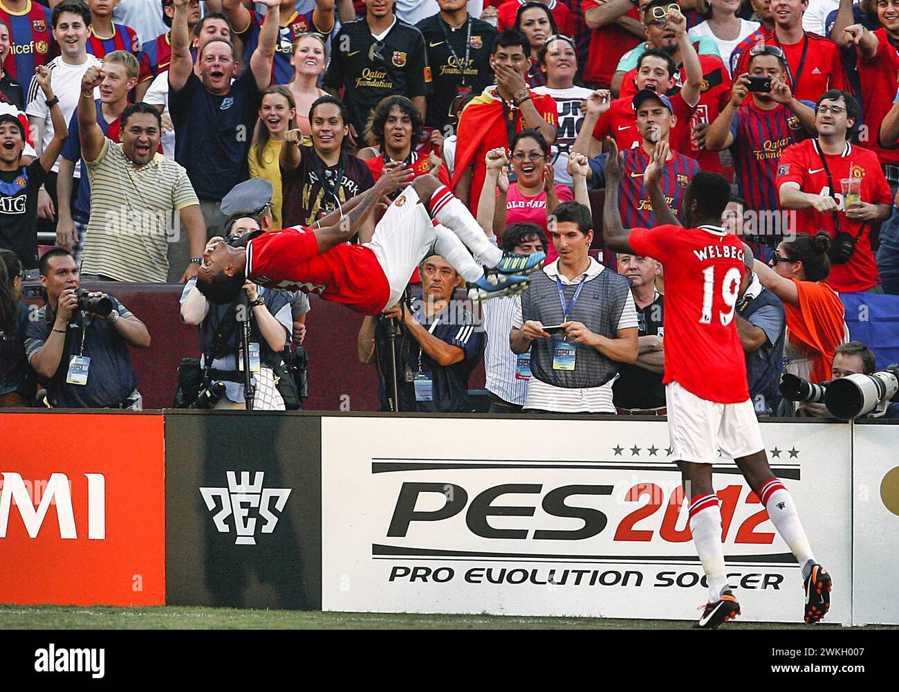 Nani (17) of Manchester United in midair after scoring the first goal during a World Football Challenge match against FC Barcelona at Fedex Field, in Landover, Maryland.Manchester United won 2-1. Stock Photo