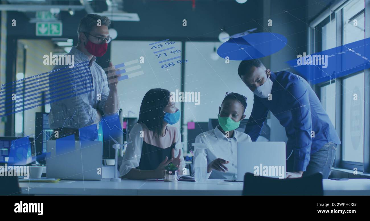 Image of financial data processing over diverse business people with face masks at meeting Stock Photo