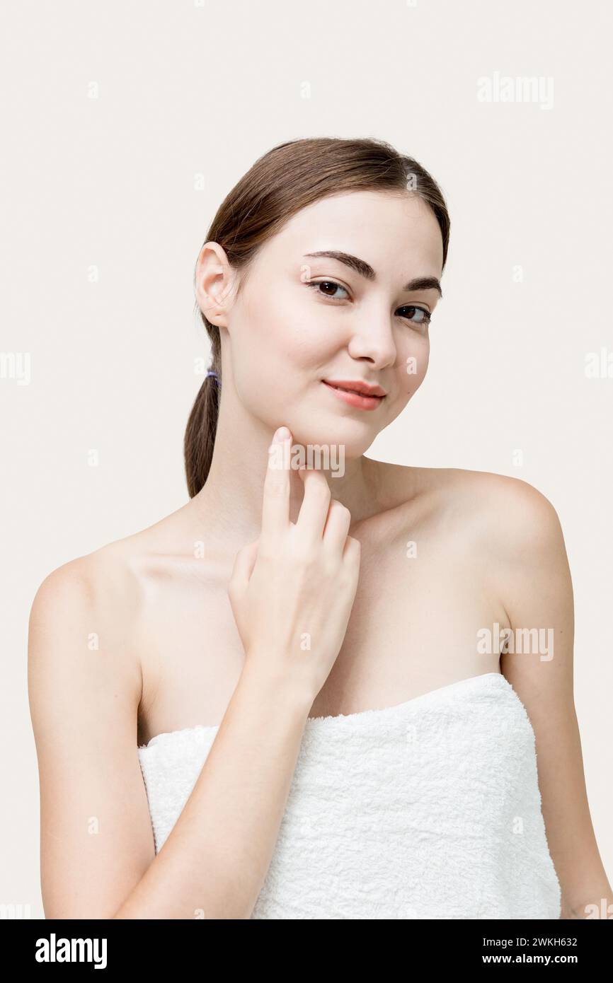 portrait young beauty women in towel for spa cosmetics facial and body healthcare treatment model vertical shot Stock Photo