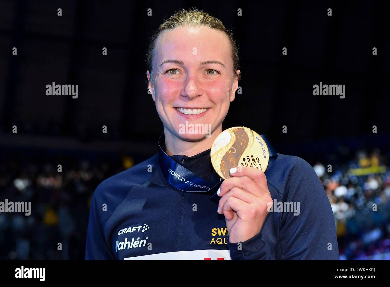 Doha, Qatar. 18th Feb, 2024. Sarah Sjoestroem of Sweden shows the gold