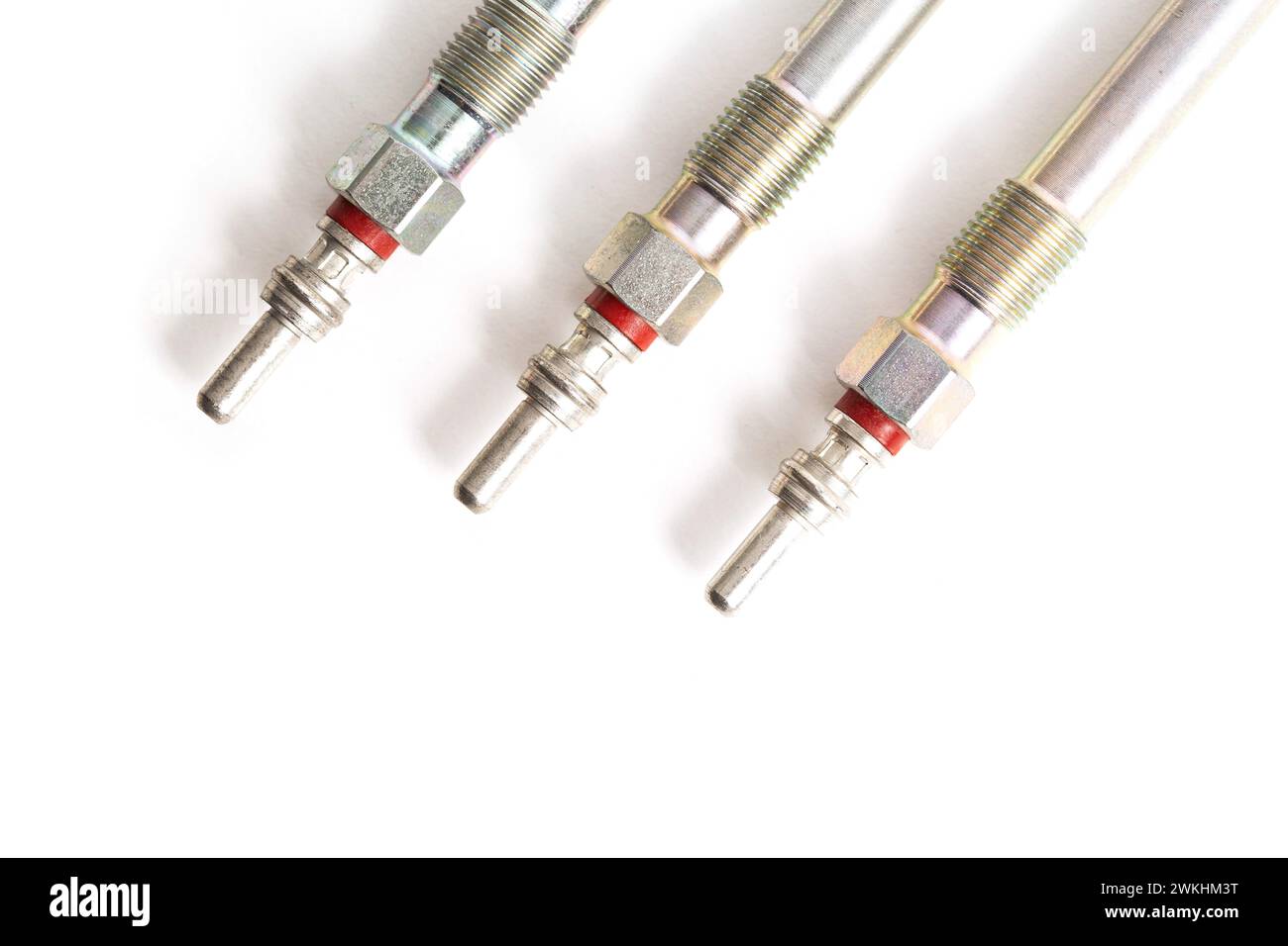 Rod ceramic glow plugs for a diesel engine on a white background, close-up, isolate. Stock Photo