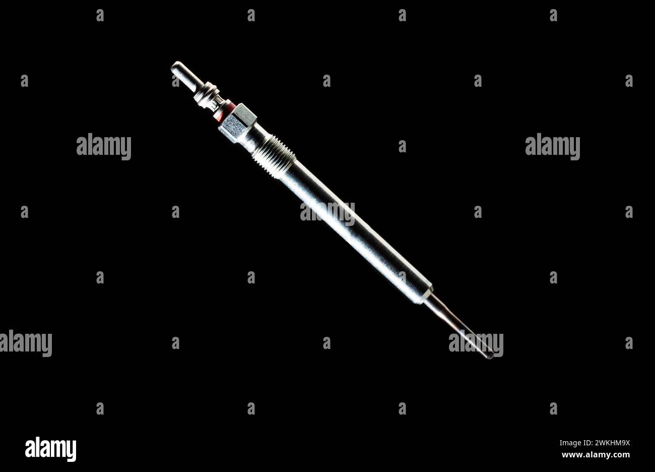 Modern glow plug with a ceramic rod for a diesel engine on a black background, isolate, close-up. Heating element of the combustion chamber of a car, Stock Photo
