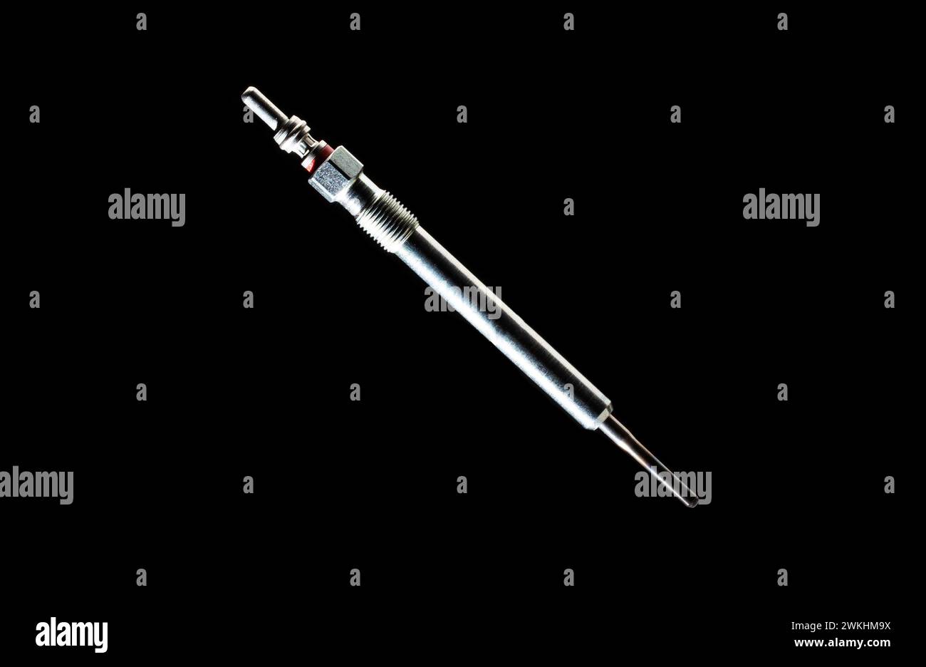 Modern glow plug with a ceramic rod for a diesel engine on a black ...